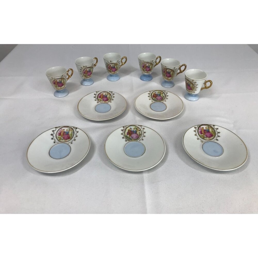 VINTAGE FOOTED DEMITASSE CUPS AND SAUCERS ~ CAMEO PRINT W/ GOLD DETAIL